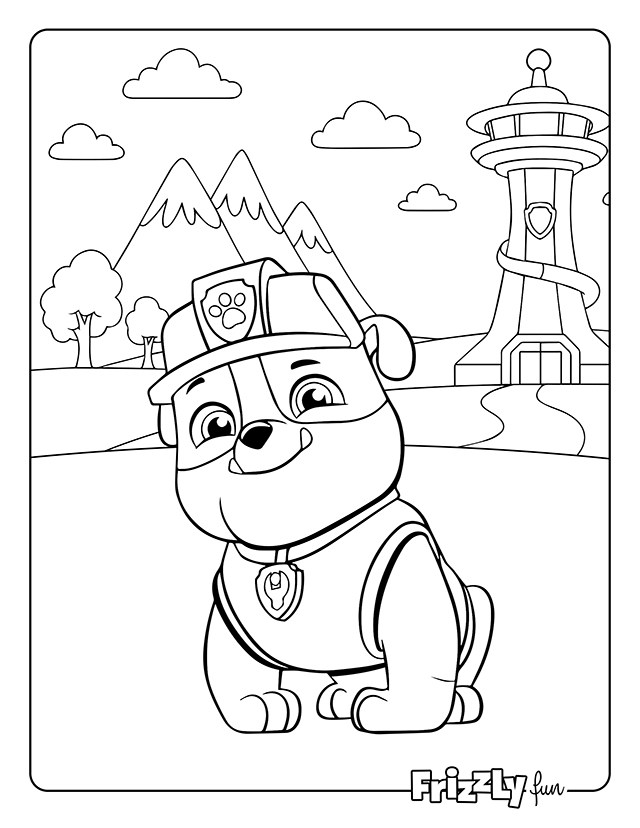 Paw Patrol puppy Rubble sitting with mountains and tower in the background.